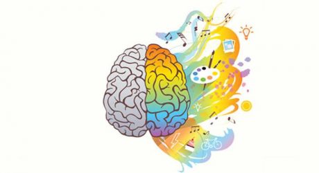 An illustration of brain with the right side in rainbow color spreading out